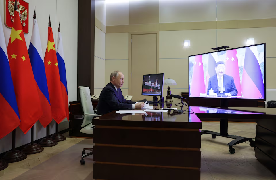 Xi Jinping and Putin Discuss Global Relations, Including Trump, Ukraine, and Taiwan